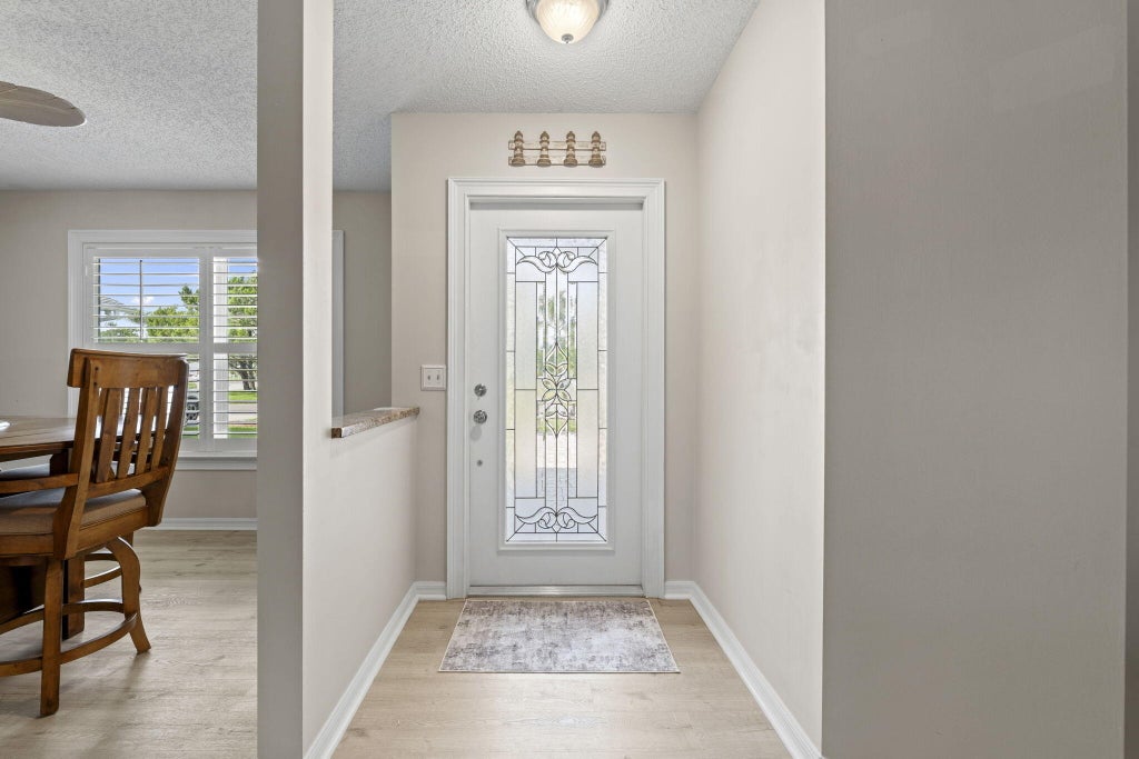 Photo of 550 PAUROTIS Lane, Fort Pierce, FL 34982 (MLS # B26077230)
