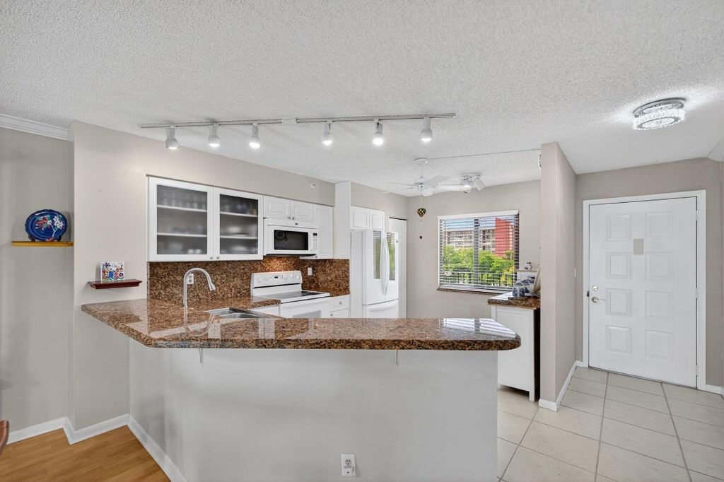 Photo of 2205 S Cypress Bend Drive #505, Pompano Beach, FL 33069 (MLS # F10514776)