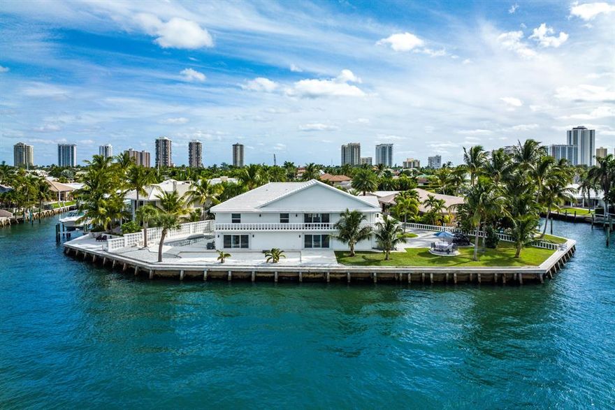 Sunsets and Serenity...Enjoy 228 + Feet of private and amazing expansive Intracoastal water views! 6000 + SqFt of Living Space0.40 Acre Lot Just minutes to the ocean via the Palm Beach Inlet with no fixed bridges. This custom-built estate, a staple of Singer Islands waterfront homes, offers luxurious Intracoastal, expansive water views.Upon entering the home, you will be welcomed by a grand custom staircase leading to an open concept upper-level floor plan. There, you will find a custom kitchen, a large family and dining area, three bedrooms, including the primary suite, and a bonus room. On the lower level, you will find a large living room, wet bar, guest bedroom, and bonus room. Perfect for entertaining. Come and experience for yourself.