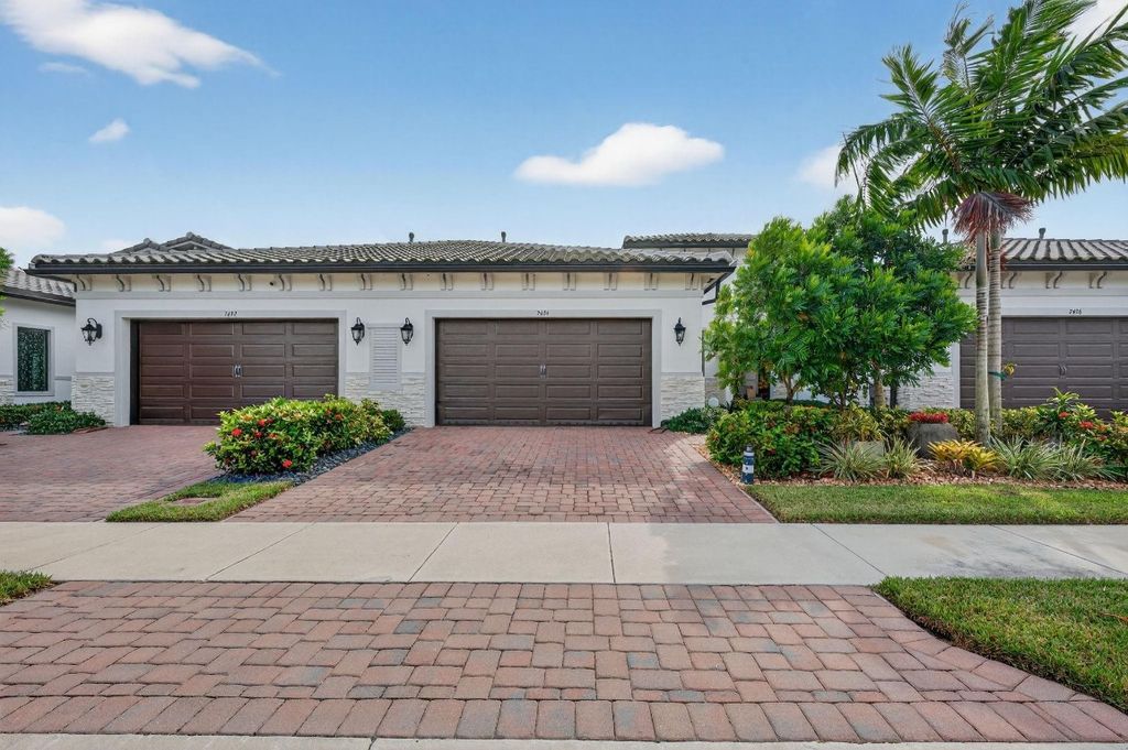 Photo of 7434 N Blue Spring Drive, Parkland, FL 33067 (MLS # F10534210)