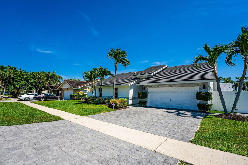 Photo of 436 Sequoia Lane, Boca Raton, FL 33487 (MLS # R11104638)