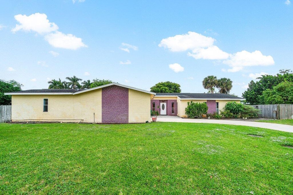 Photo of 3059 Indian Trail, Lake Worth, FL 33462 (MLS # R11036846)