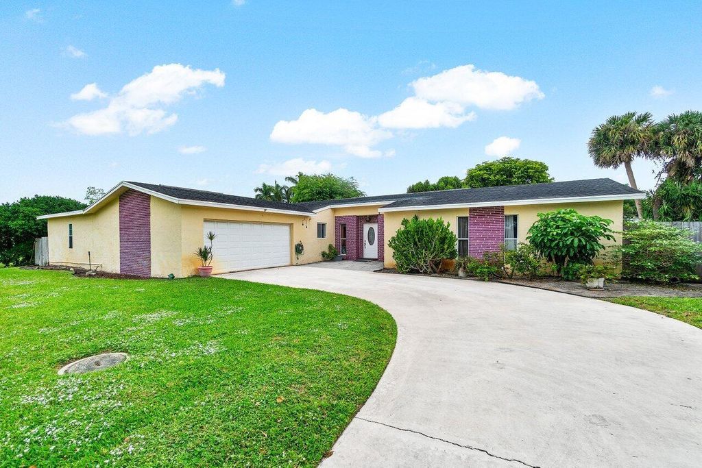 Photo of 3059 Indian Trail, Lake Worth, FL 33462 (MLS # R11036846)