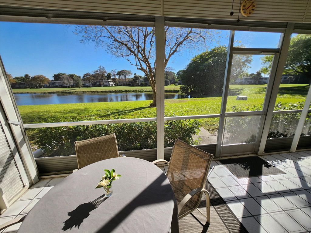 Photo of 4030 W Palm Aire Drive #101, Pompano Beach, FL 33069 (MLS # F10549993)