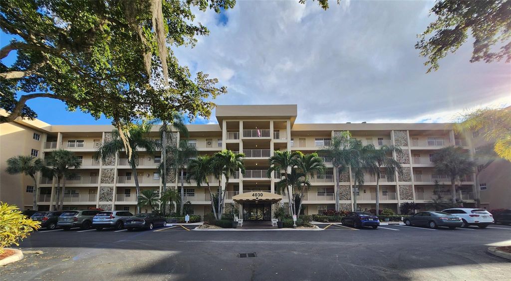 Photo of 4030 W Palm Aire Drive #101, Pompano Beach, FL 33069 (MLS # F10549993)