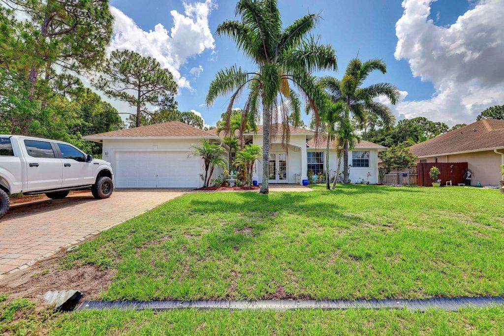 Photo of 3981 SW Bamberg Street, Port Saint Lucie, FL 34953 (MLS # R10807781)