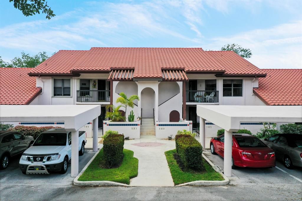 Photo of 6040 SE Martinique Drive #101, Stuart, FL 34997 (MLS # R10701506)