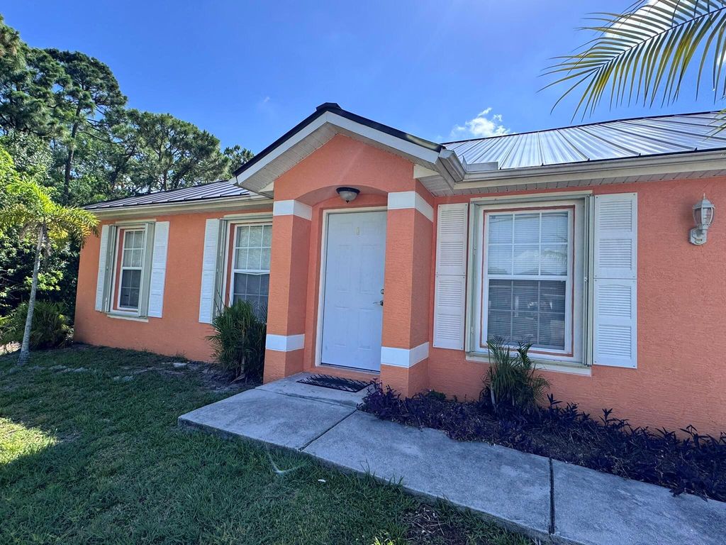 Photo of 5906 Spruce Drive, Fort Pierce, FL 34982 (MLS # R11092844)