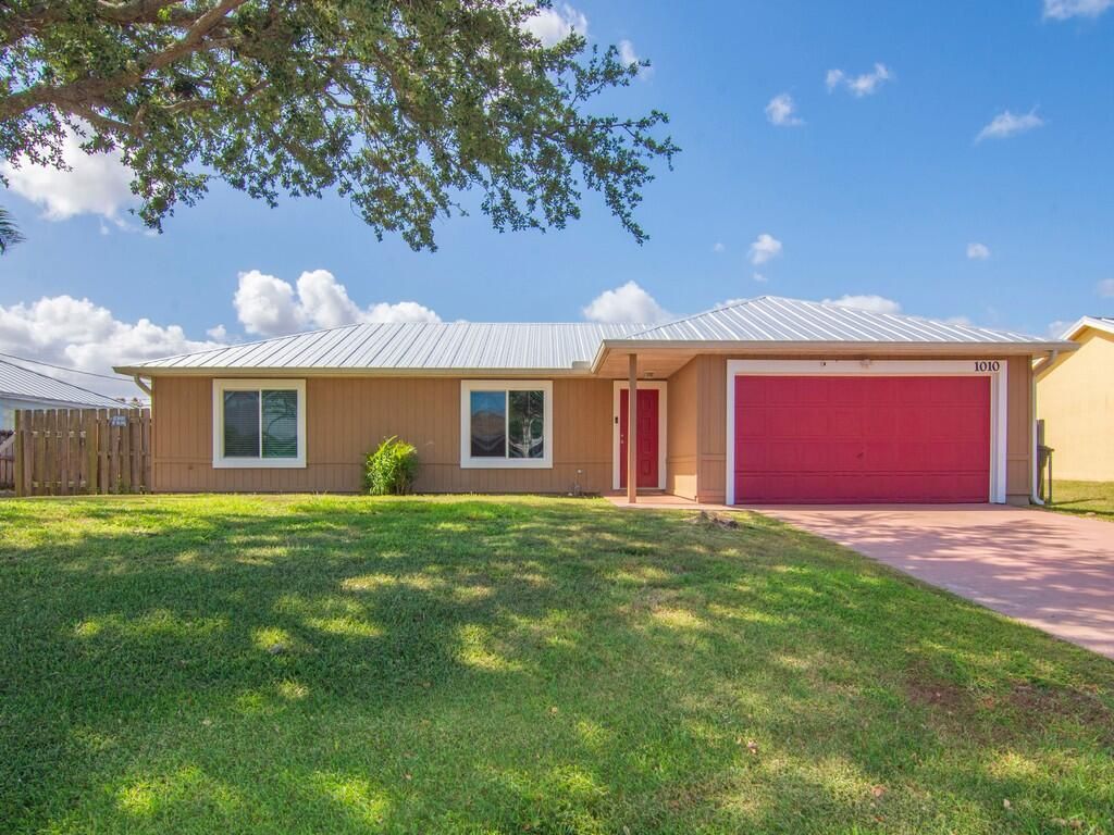 Photo of 1010 SW Versailles Avenue, Port Saint Lucie, FL 34953 (MLS # R11083441)