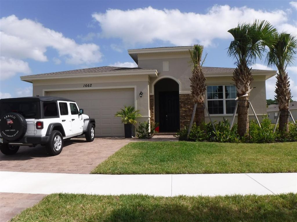 Photo of 1662 NW Vivanco Street, Port Saint Lucie, FL 34986 (MLS # R10767809)