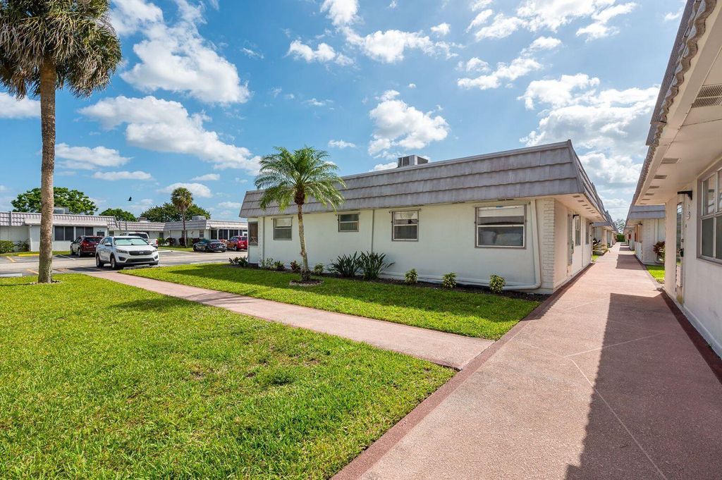 Photo of 92 Valencia Drive #D, Delray Beach, FL 33446 (MLS # B26020961)