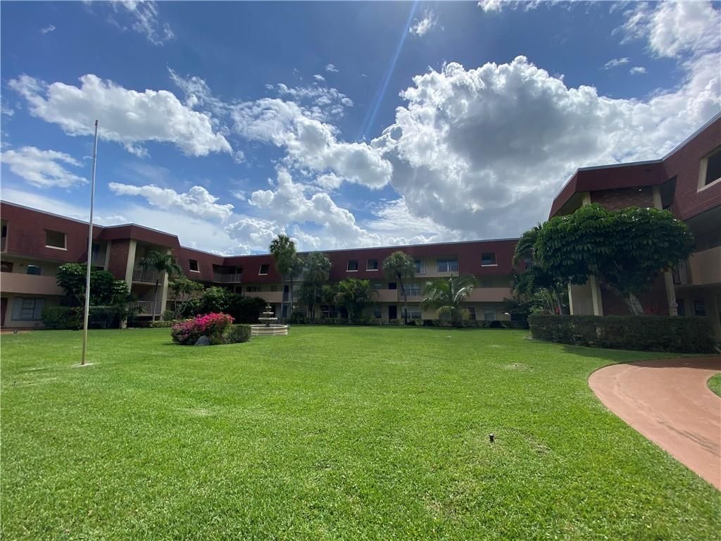 Photo of 3071 NW 47th Ter Ter #216, Lauderdale Lakes, FL 33313 (MLS # F10335351)