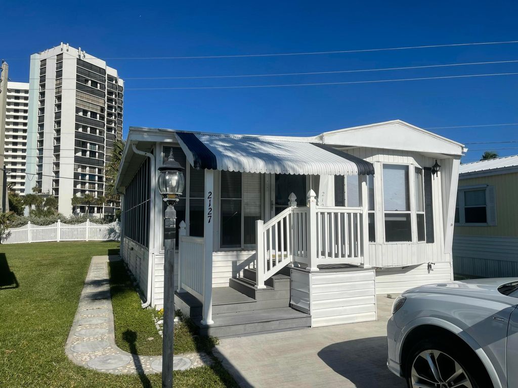 Photo of 2127 Nettles Boulevard, Jensen Beach, FL 34957 (MLS # R11044975)