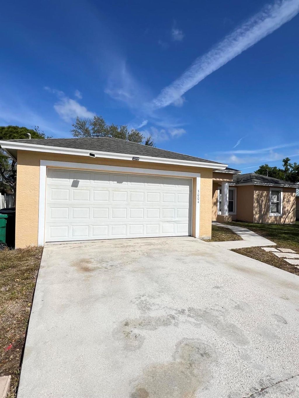 Photo of 5004 NW Fitzgerald Avenue, Port Saint Lucie, FL 34984 (MLS # R11065144)