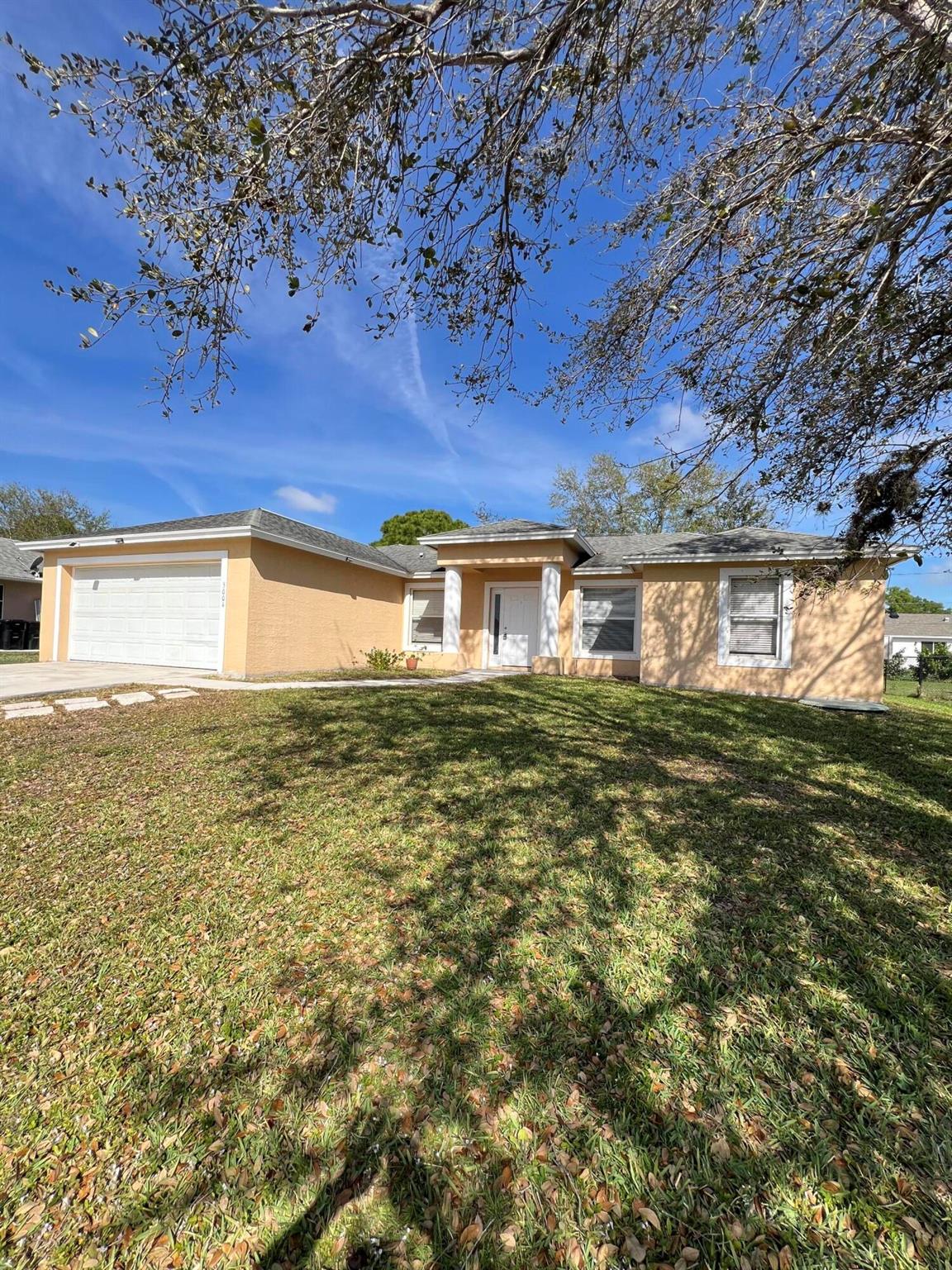 A spacious three bedroom two bath home with two car garage. located in quiet location. tile floors in the living areas and the three bedrooms have carpet. the kitchen has ample cabinets and countertops with stainless steel appliances. comes with washer and dryer and a newer AC. A large front and back yard provides lots of space for kids to play. This home is centrally located and waiting for you to call it home!