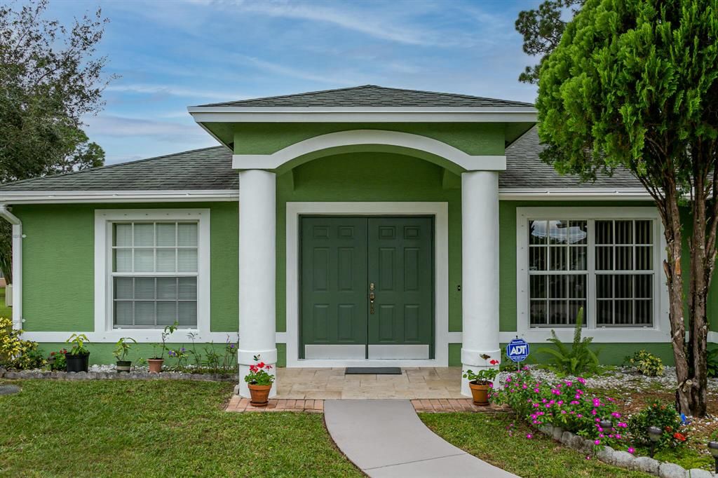 Photo of 1458 SW Santiago Avenue, Port Saint Lucie, FL 34953 (MLS # R10756560)