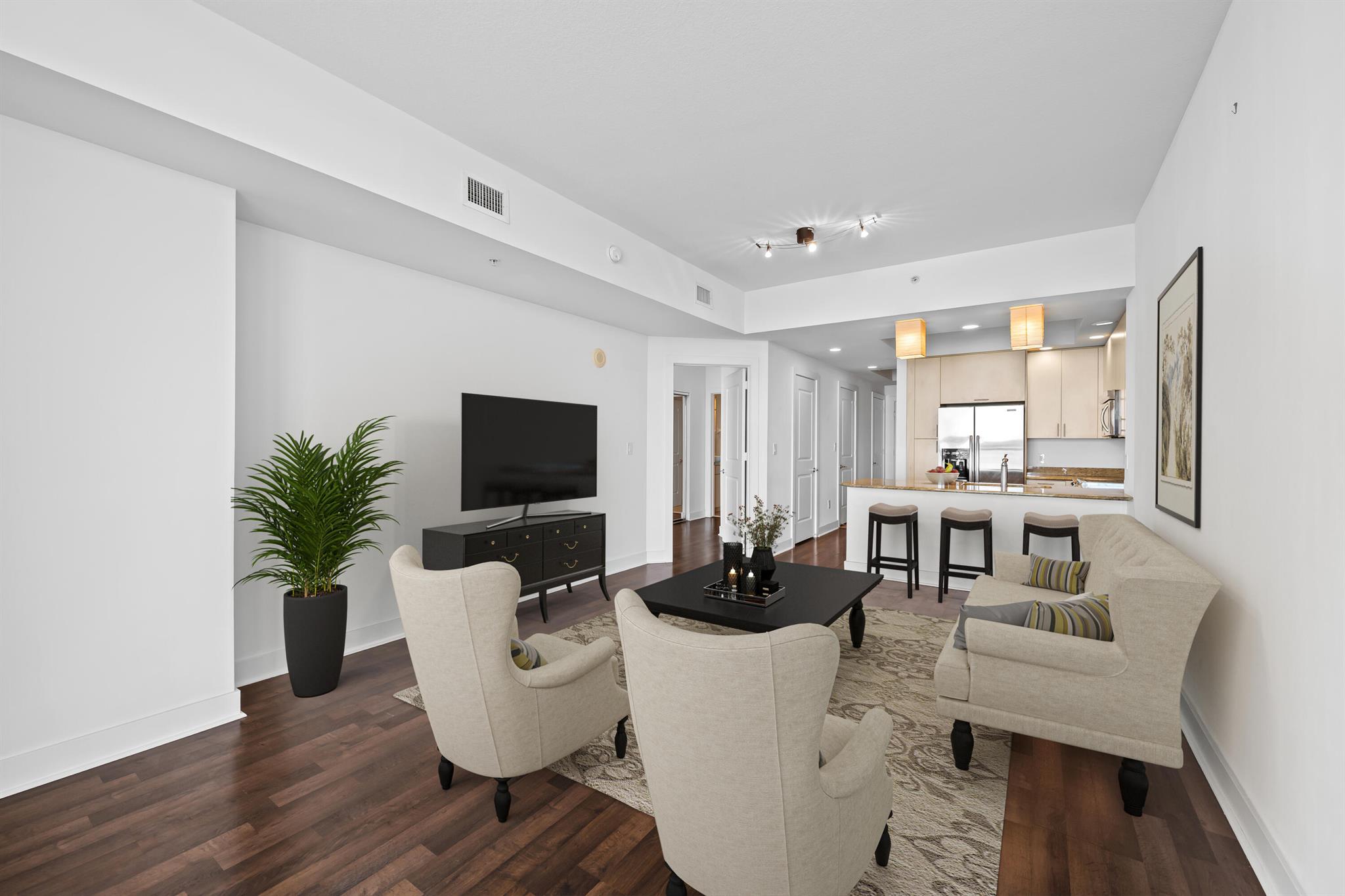 Welcome to your urban oasis in the heart of downtown! This stunning 1BR, 1.1 BA residence offers a modern living experience with panoramic city views from the spacious living area and an extended terrace. The bright interior features hardwood flooring, impact windows, stainless steel kitchen appliances, washer and dryer. Strada 315 features secure garage parking, heated pool & spa, well equipped fitness center, attended lobby & private clubroom. Located just steps away from downtown shops and restaurants, this residence provides the ultimate urban lifestyle.