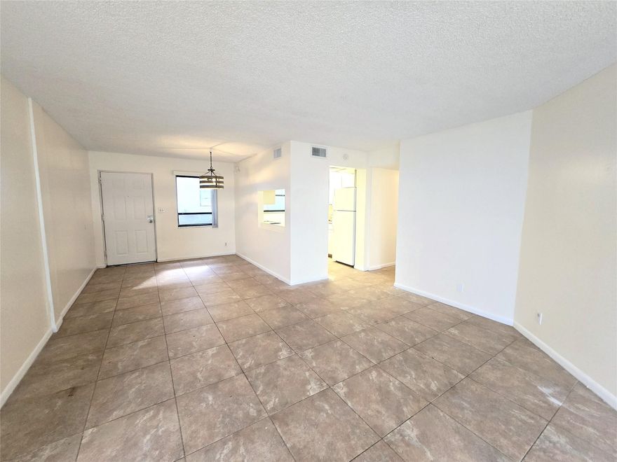 Charming Condo for Rent! Step into this bright and airy condo, flooded with natural light throughout and featuring stylish tile floors. Located in the highly sought-after heart of West Palm Beach, this unit offers the perfect balance of comfort and convenience. Relax on your private balcony, or take advantage of the community amenities including a pool, tennis court, clubhouse, laundry facilities, and scenic walking trails around lush green spaces. The condo is well-maintained offering peace of mind and comfort. Ideally located close to I-95, PBI Airport, Ballpark of the Palm Beaches, Palm Beach Outlets, and more – everything you need is just minutes away. This is the perfect place to call home, offering a safe, quiet, and family-friendly environment. You will love living here!