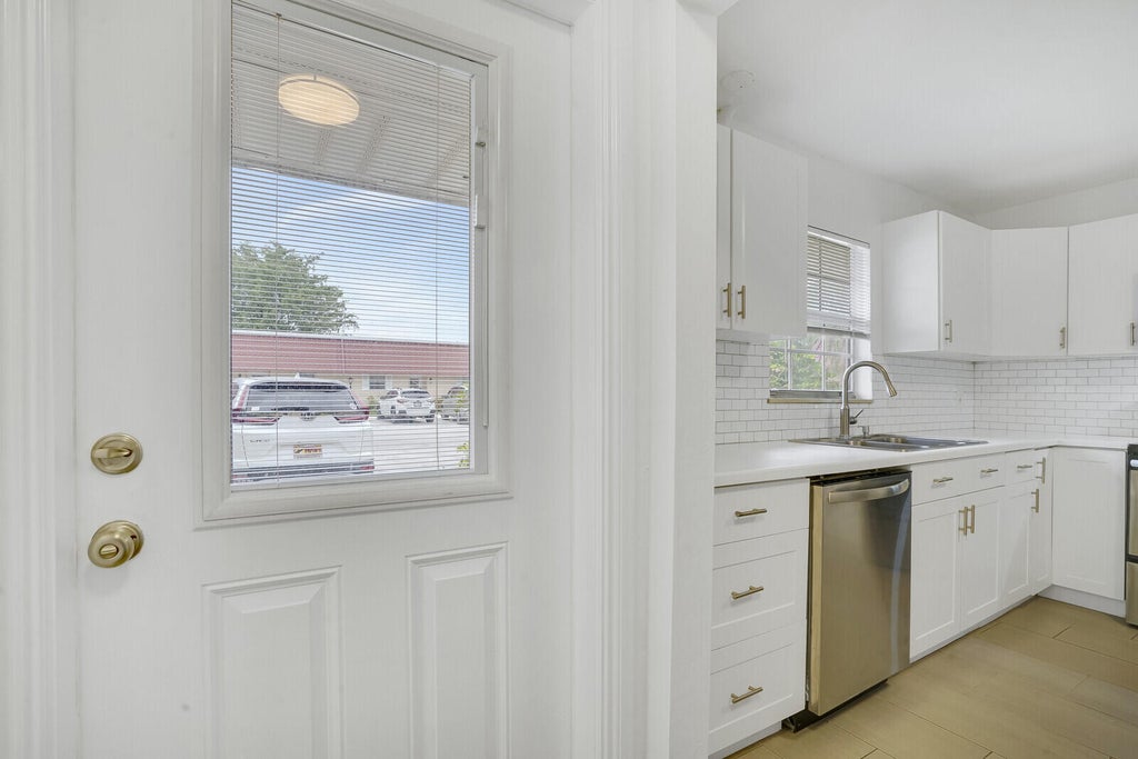 Photo of 226 Down East Lane, Lake Worth, FL 33467 (MLS # R10948931)
