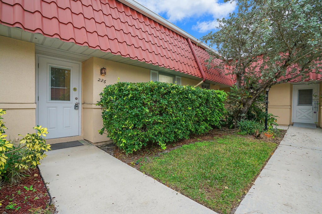 Photo of 226 Down East Lane, Lake Worth, FL 33467 (MLS # R10948931)