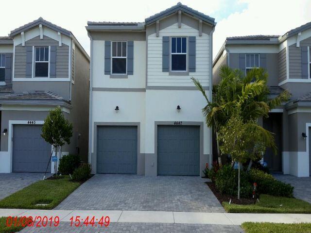 Photo of 4447 NW 48th Terrace, Tamarac, FL 33319 (MLS # B26049895)