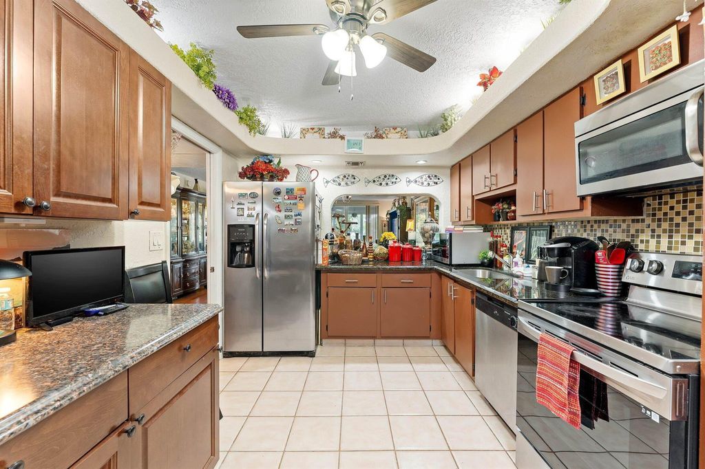 Photo of 2850 Forest Hills Boulevard #201, Coral Springs, FL 33065 (MLS # R11129472)