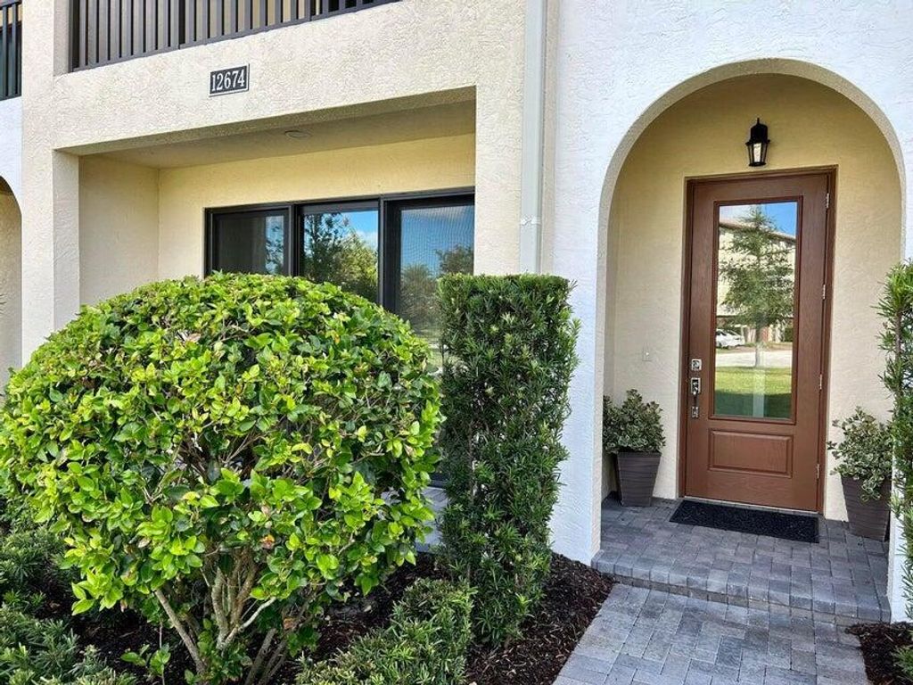 Photo of 12674 Machiavelli Way, Palm Beach Gardens, FL 33418 (MLS # R11141182)