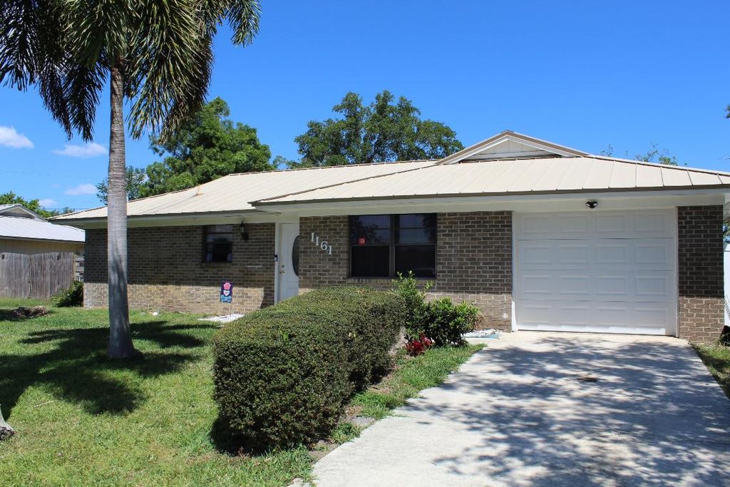 Photo of 1161 SW Gardena Avenue, Port Saint Lucie, FL 34953 (MLS # R10974491)