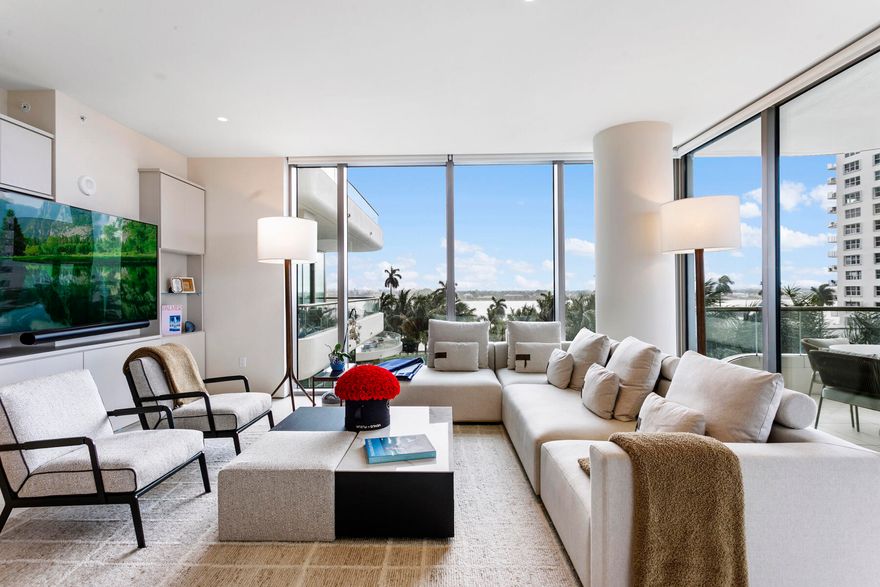 La Clara residence 402 offers a one-of-a-kind oversized floorplan, thus providing the largest format 2 BR / 2.5 BA in the building. Its wraparound balcony is over 800 sqft and accessible from both bedrooms and the living room, providing expansive East, South, and West exposures. Uniquely, 402 is located within the -01 stack, making it a private, end unit with a singular neighbor. All appliances are Bosche, including gas stove. Custom closets and an entertainment center have been built-in. 9' ceilings and electric blinds throughout. Full-sized laundry room with storage. Deeded garage parking for one vehicle plus unlimited valet for guests. Large temperature-controlled storage unit also included... see building details in supplement below. With only 83 residences, the La Clara is a boutique building where every unit has direct Intracoastal views and bright, cheerful natural light. Located on scenic South Flagler Drive in West Palm Beach, across the Royal Park Bridge - equidistant from the bustling downtown city centre of West Palm and the iconic destination of Palm Beach Island. Amenities include fitness center, outdoor pool with towel service, cinema room, wine room, business center, chef's entertaining kitchen, sauna, and spa.