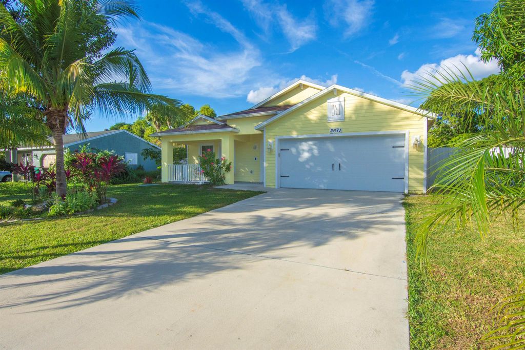 Photo of 2671 SE Caladium Avenue, Port Saint Lucie, FL 34952 (MLS # R11147145)
