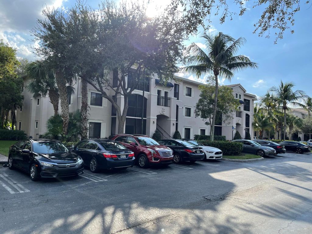 Photo of 3022 Alcazar Place #101, Palm Beach Gardens, FL 33410 (MLS # R10933418)