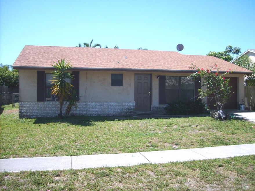 Fixer-Upper in Lake Worth with good proximity to a school and a playground.  Currently tenant occupied on a month-to-month basis.  Buy the home and the tenant can stay or fix it up for your use or for investment.  The roof is only 10 years young.  Current owners have used the property as a rental at $1400.00 per month.