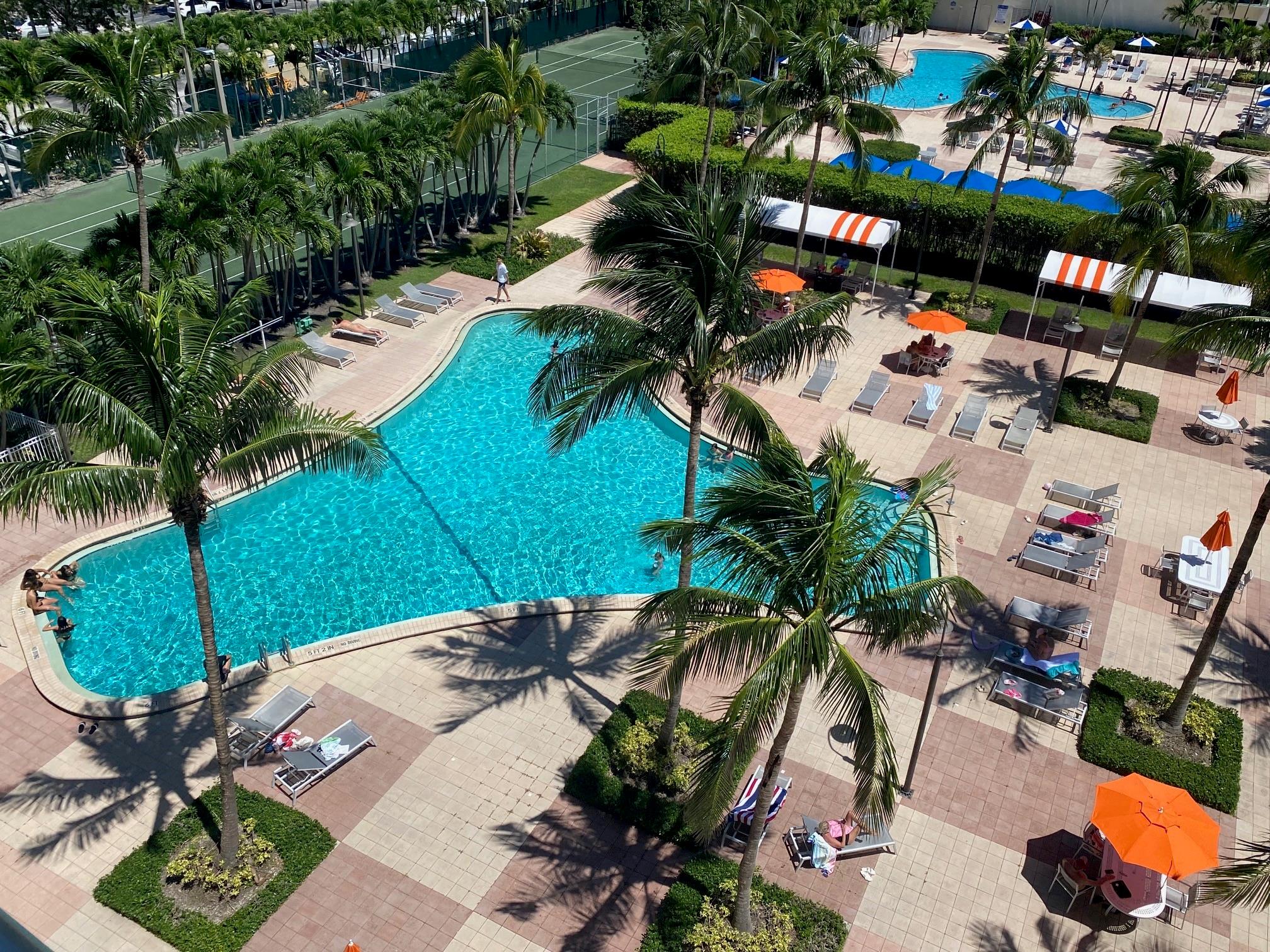 LARGE UPDATED 2/2 ACROSS THE STREET FROM THE BEACH! REMODELED BATHROOMS!UPDATED OPEN KITCHEN! NEW ENGINEERED WOOD FLOORS THRU-OUT! FOUR WALK-IN CLOSETS!! COVERED PARKING!! GREAT COMPLEX IN RITZY SUNNY ISLES BEACH!! GORGEOUS POOL AREA, FULL MODERN GYM, LIT TENNIS COURTS, 24-HR SECURITY AND VALET PARKING FOR GUESTS!! WALK TO BEACH, SHOPPING AND HOUSES OF WORSHIP!!