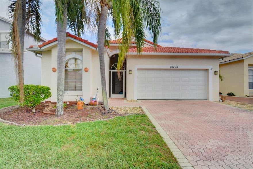Incredible opportunity to own this stunning, totally turnkey villa in charming Madison Lakes gated community. Filled with updates, this bright, pristine space features an open-concept floorplan, ceramic tile and laminate flooring, vaulted ceilings and updated finishes. Gorgeous eat-in kitchen boasts updated appliances and contemporary cabinetry (2018 Fridge / 2016 Stove & Dishwasher / 2017 microwave). Lovely owner's suite with cathedral ceiling, walk-in closets and bath with huge double vanity. Covered, screened patio offers a sheltered spot for outdoor seating and dining. Fenced backyard offers privacy for pets, playtime or entertaining. Additional updates incl: 2018 Hot water htr / 2017 HVAC / 2015-16 Wshr-Dryr / 2018 New Garage Door, Opener, Spring, Track, Motor. Don't miss this one!