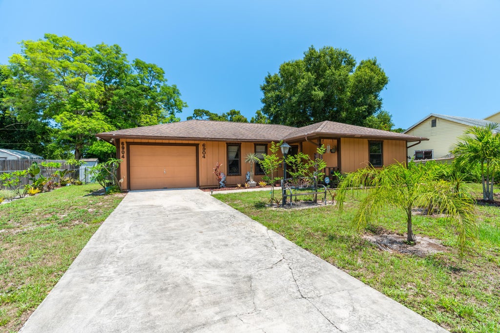 Photo of 6904 Belleair Avenue, Fort Pierce, FL 34951 (MLS # R10990258)