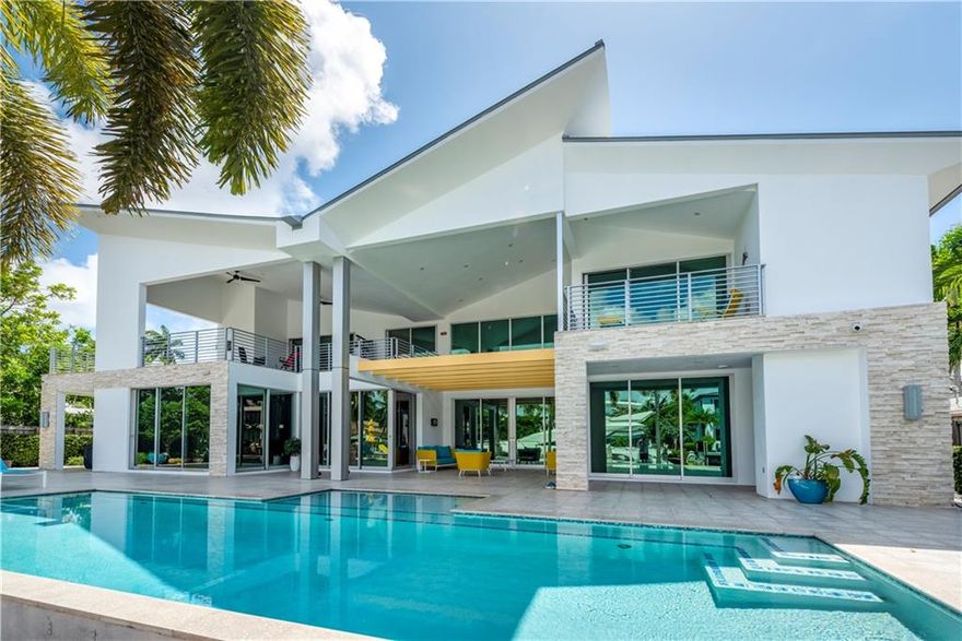 "CUSTOM TRANSITIONAL CONTEMPORARY" PRIME 100' OF DEEP WATER DOCKAGE IN SOUTH LAS OLAS LOCATION! 5 MINUTES TO PORT EVERGLADES, 5 MINUTE WALK TO BEACH AND DOWNTOWN FORT LAUDERDALE! LABOR OF LOVE CUSTOM BUILT IN 2014 WITH PREMIUM DETAILS! TOP OF THE LINE FLEETWOOD/PGT WINDOW AND DOOR PACKAGE WITH ZERO POST SLIDING DOORS!  ALL CONCRETE AND STEEL CONSTRUCTION! AUTOMATED PUSH BUTTON LIGHTING AND DRAPE CONTROLS! 8,100+ SF GROSS 4,653 SF UNDER AIR 3 CAR GARAGE, ELEVATOR AND TROPICAL POOL! 5 BEDROOMS ALL WITH ENSUITE BATHROOMS! HUGE OUTDOOR GYM! GROUND FLOOR MASTER SUITE! GAS GOURMET KITCHEN WITH ALL OF THE BEST APPLIANCES!  THIS STUNNING CUSTOM RESIDENCE OFFERS THE FINEST ELEMENTS OF MODERN ARCHITECTURE!