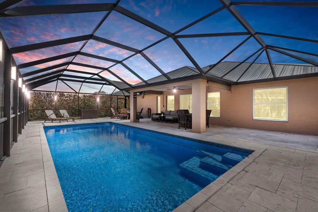 Photo of 537 SW Laconic Avenue, Port Saint Lucie, FL 34953 (MLS # R11168078)