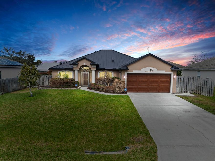 Beautifully refreshed & truly move-in ready, this exceptional 4BR/2BA home with a versatile flex room (ideal for office, den, or 5th bedroom) offers the perfect blend of quality construction and modern upgrades. Built in 2006 & updated to perfection, it feels & shows like new w/ stunning finishes & pride of ownership. Major improvements include a 2024 metal roof, tile flooring throughout, updated lighting, fresh paint inside & out, & a beautifully renovated kitchen. Step outside to your private backyard retreat featuring a heated pool, travertine deck, & screened enclosure w/ custom lighting--designed for year-round enjoyment. The fully fenced yard offers extra parking for an RV or boat, plus a built-in patio with firepit, making this home ideal for entertaining & non stop outdoor living. Conveniently located w/ easy access to I 95, the Turnpike, & just minutes from Tradition & Martin Co. Don't miss this rare opportunity to own a meticulously updated home in a prime PSL location.