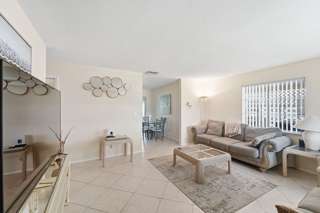 Photo of 220 Leisure Boulevard, Pompano Beach, FL 33064 (MLS # B26028975)