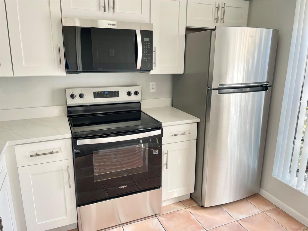 Photo of 2700 S Oakland Forest Drive #308, Oakland Park, FL 33309 (MLS # F10541959)