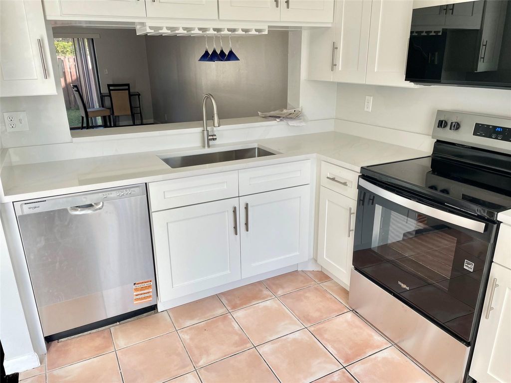 Photo of 2700 S Oakland Forest Drive #308, Oakland Park, FL 33309 (MLS # F10541959)