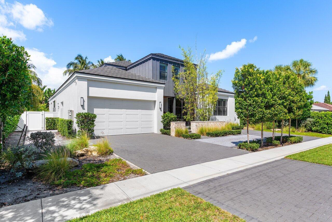 Modern Elegance in Boca Raton - Custom-Built Luxury LivingStep into refined South Florida living with this stunning custom-built masterpiece located in East Boca Raton's Camino Lakes. Built by Gulfstream Custom Builders in 2022, this one-of-a-kind residence boasting 3,805 square feet under air, offers a perfect blend of sophistication, functionality, and elevated design.As you enter through the front door, you're immediately greeted by the oversized main living space, a bright and open area that resonates true architectural elegance. Throughout the home, large-scale porcelain tiles and soaring 10-foot ceilings on the main level and 9-foot ceilings upstairs, enhance the sense of space and refinement.