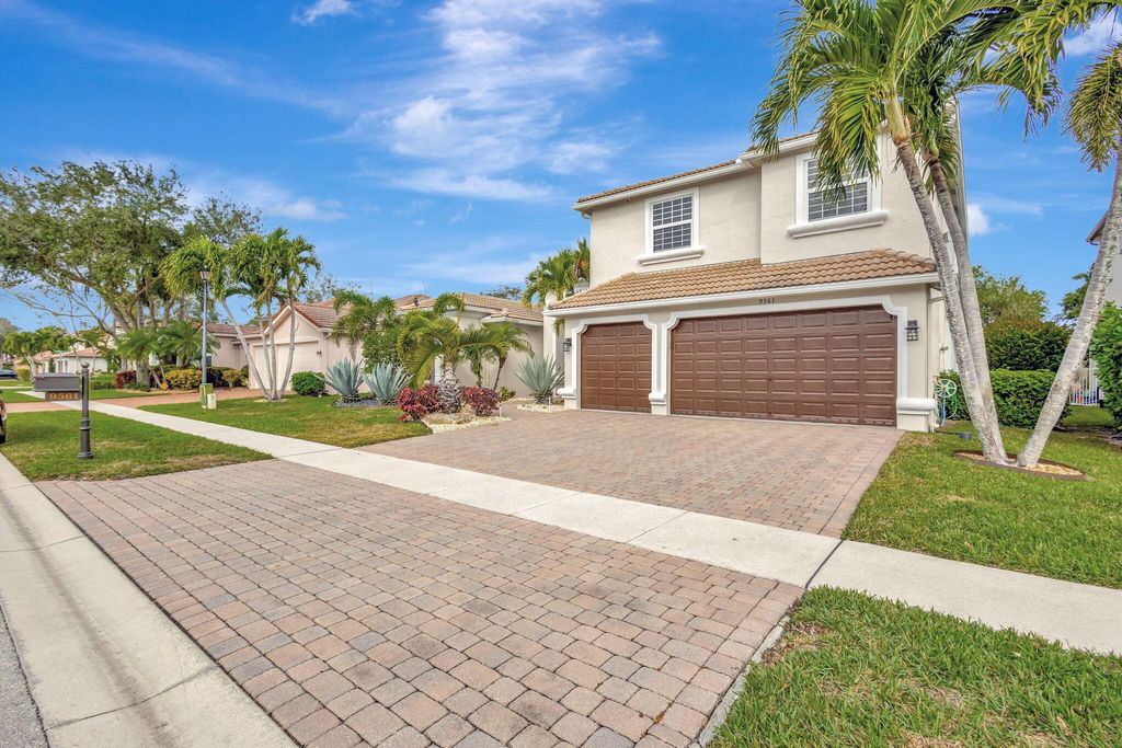 Photo of 9561 Campi Drive, Lake Worth, FL 33467 (MLS # R11053418)