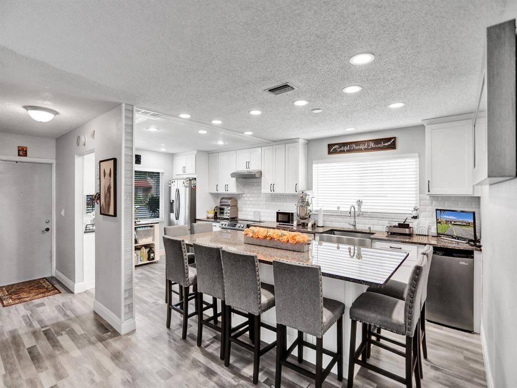 Photo of 138 Lake Barbara Drive #138, West Palm Beach, FL 33411 (MLS # F10550387)