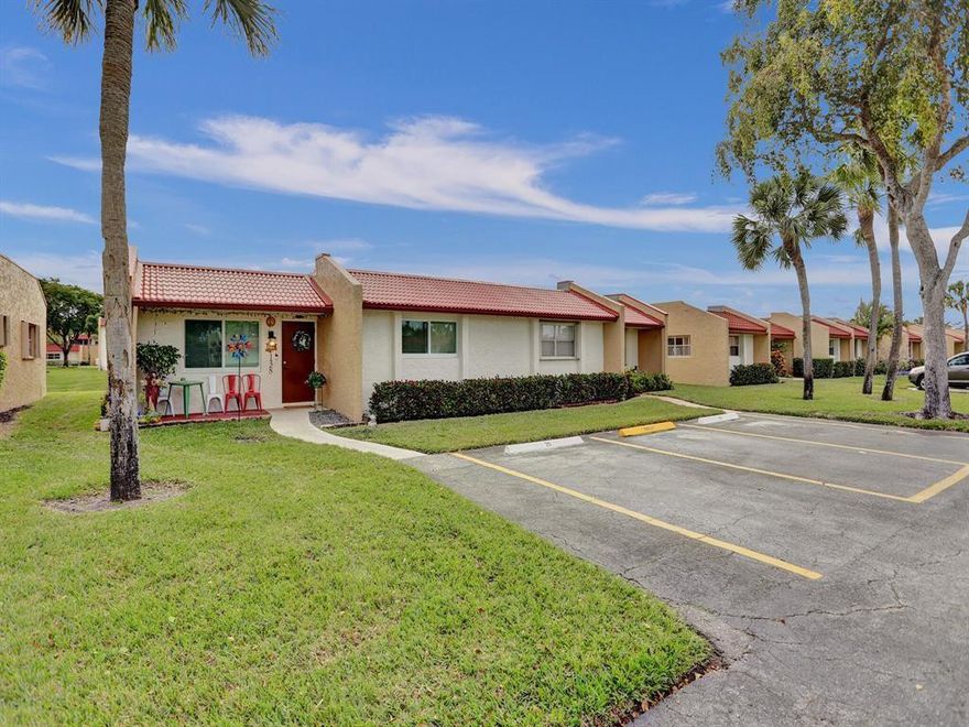 MOTIVATED SELLER, SUBMIT YOUR BEST OFFER.  GORGEOUS TURN KEY Stunning 2BR/2BA Villa in the vibrant 55+ community of Golden Lakes Village. This beautifully renovated corner unit offers peace of mind with hurricane-impact windows and an abundance of natural light throughout. Step inside to a spacious open kitchen featuring a generous island, granite countertops, and stainless-steel appliances—perfect for everyday living, entertaining, and culinary adventures.Both bathrooms have been tastefully updated, and the home boasts luxury vinyl plank flooring throughout, a newer A/C (2023), and an in-unit washer and dryer. Enjoy tranquil water views from the enclosed patio, creating the perfect space to relax year-round.  Golden Lakes Village offers more than just a home—it's a lifestyle.