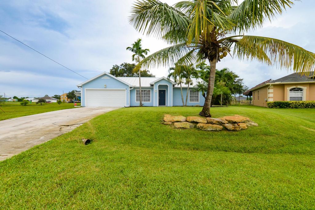 Photo of 619 SW Bradshaw Circle, Port Saint Lucie, FL 34953 (MLS # R10912112)