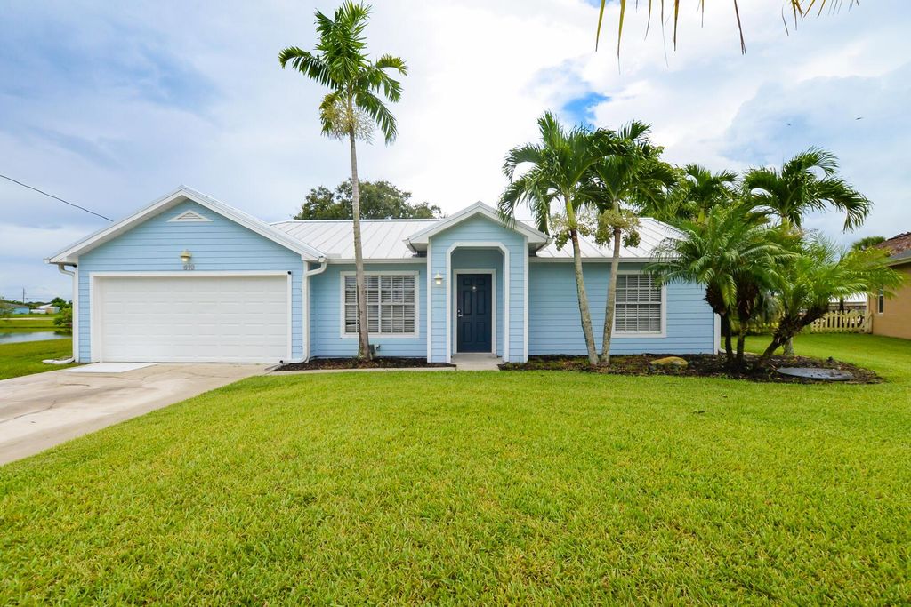 Photo of 619 SW Bradshaw Circle, Port Saint Lucie, FL 34953 (MLS # R10912112)