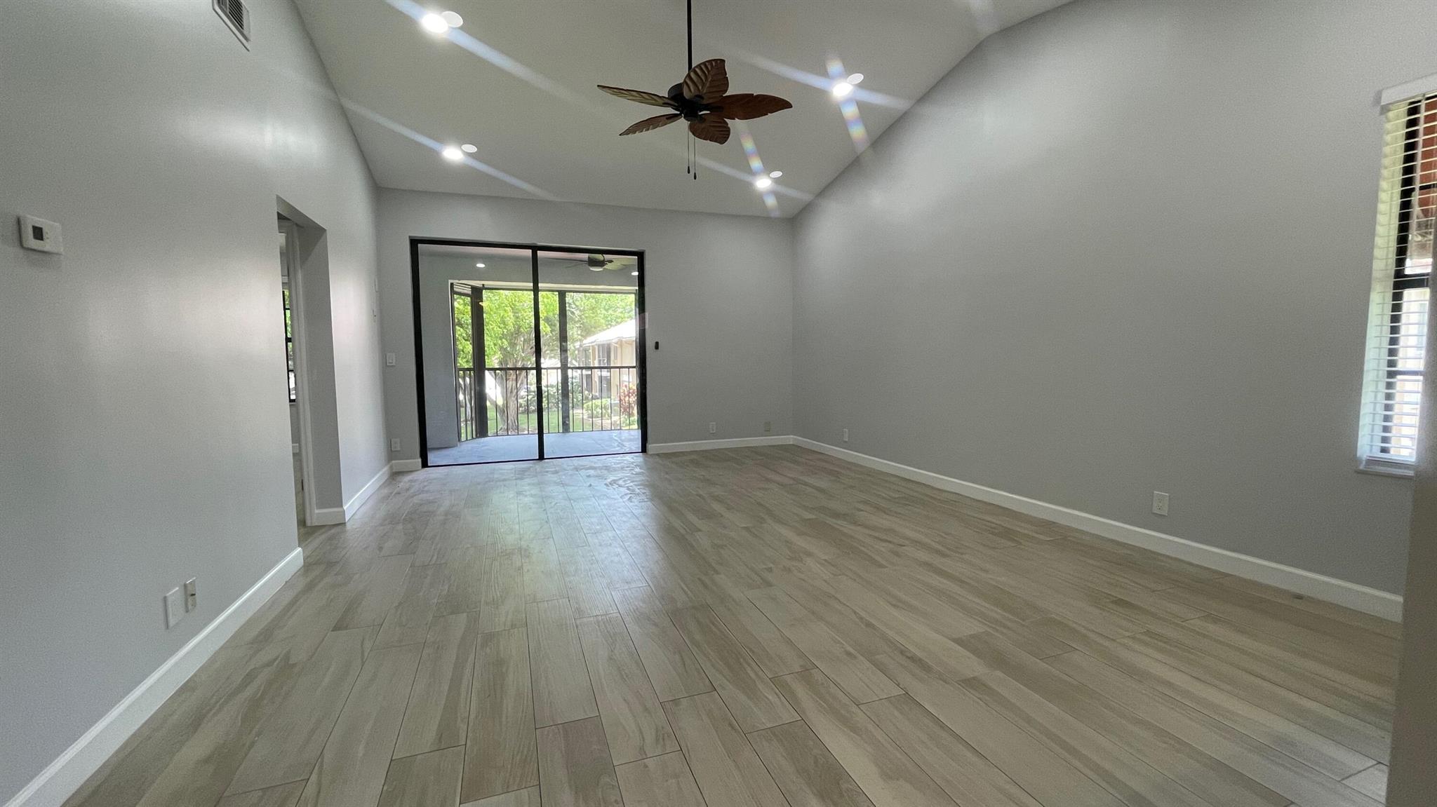 Completely renovated corner unit with direct lake views in the heart of Boca Raton. Vaulted ceilings and expansive living rooms and bedrooms. Tile floors and upgraded kitchen. The best location conveniently located and minutes from the beach, major schools and houses of worship. Water and cable included in HOA.