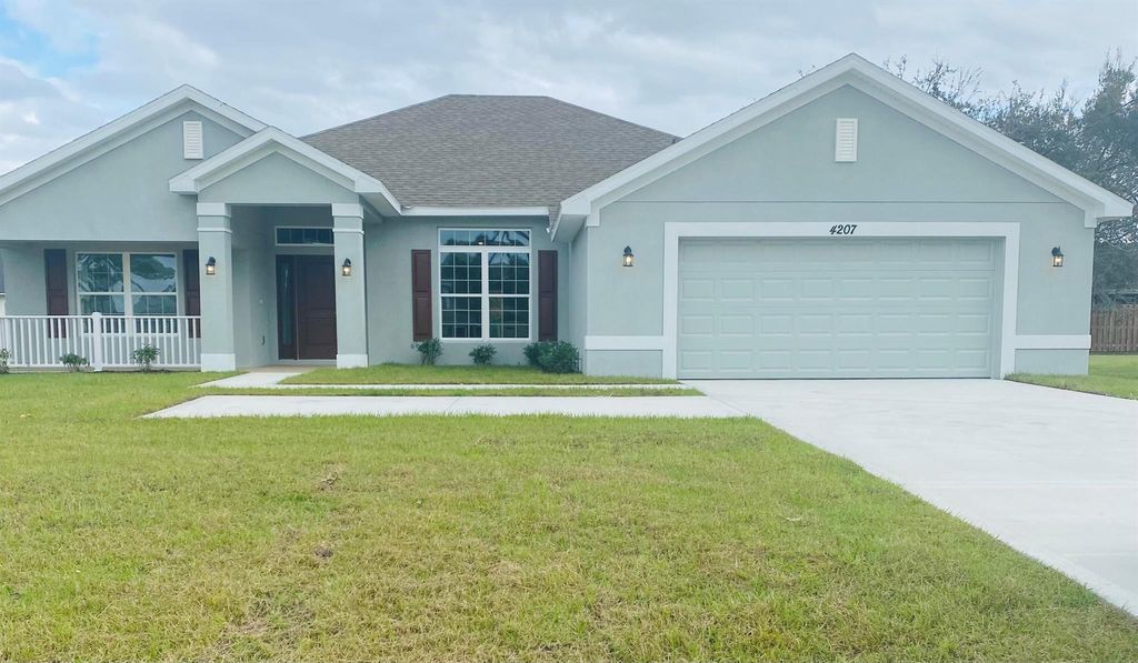Photo of 4207 SW Savona Boulevard, Port Saint Lucie, FL 34953 (MLS # R10918090)