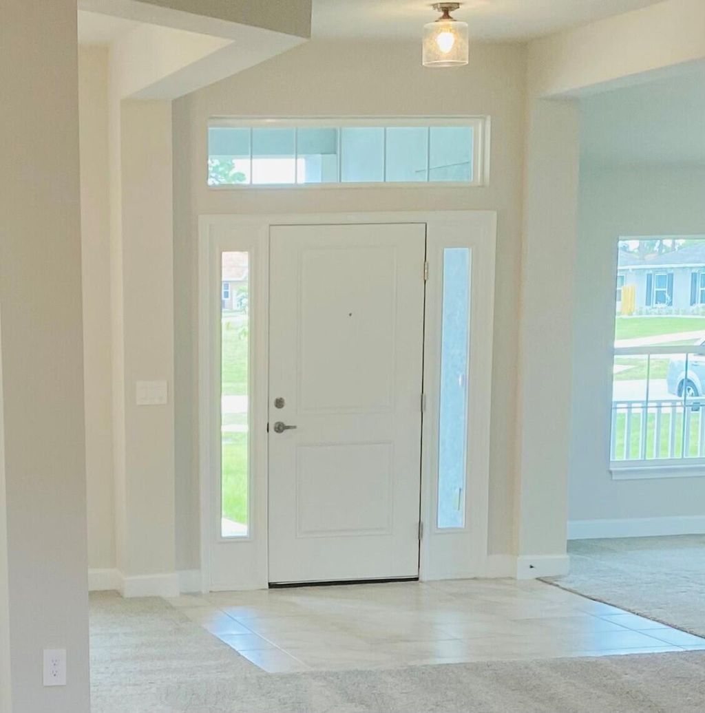 Photo of 4207 SW Savona Boulevard, Port Saint Lucie, FL 34953 (MLS # R10918090)